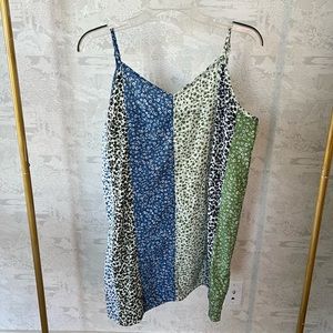 Patch work style mini dress. Size large.